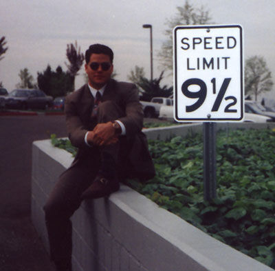 The notorius 9 and 1/2 speed limit sign in the Temple Parking Lot... and some goofy looking Elder.
Dan  Wilson
28 May 2000