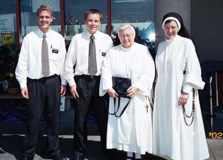 A rare photo moment of Elder Woolstenhulme and Elder Wells, with some Sisters.
Cory  Wells
17 Mar 2007