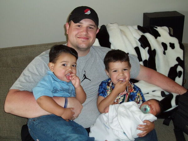 Derek and his three boys!
Karina C Taylor
31 May 2006