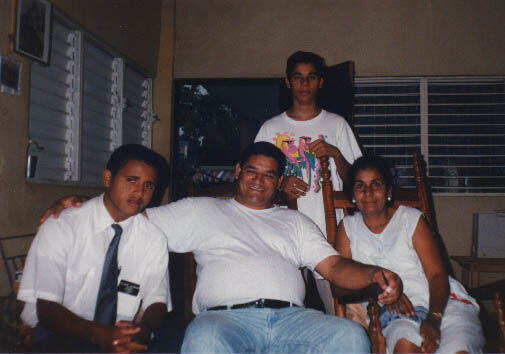 Elder Santo Guzman and some members in their home (Mom, Dad, and son).  I'm sorry to I can't remember their names right now.  Does anyone else remember their names?  I think the mom taught seminary in 1993.
Eric B Lemmon
20 Mar 2001