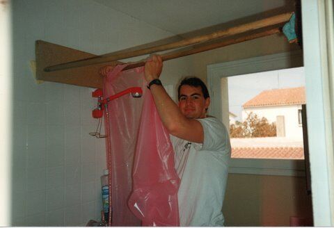 Elder Poe arranges a shower curtain for the mission apartment in La Rochelle.  Spring 1990
Andrew Paul Shakespeare
17 Dec 2008