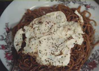 Breakfast of Yakisoba with fried eggs on top. I still eat them that way today!
Ron  Schindler
01 Sep 2004