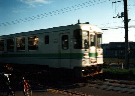 This one-car train is called a Kisha and is the only train that runs from big-city Tomakomai down to the inaka Urakawa. With the towns along that coast being so small, we'd cover the areas so quickly that we'd often take this train 20 minutes to Shizunai (north) and Erimo (south) to dendo there as well. We called it Kisha Dendo.
Jim  Dillon
25 Oct 2004