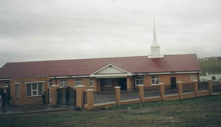 Many of the buildings built or being built outside of the city are patterned like this one.
Garrett  Wilson
15 Jul 2004