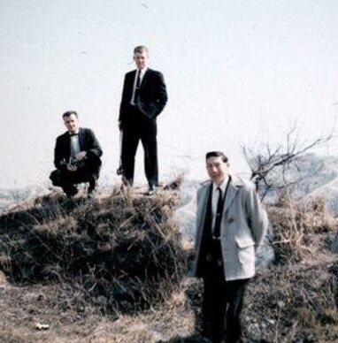 Elder Rasmussen, lower, Elder Bradshaw, standing, and Elder Tyler, squat down, atop the mountain where Korea was dedicated.
Webmaster Wayne
13 Oct 2009