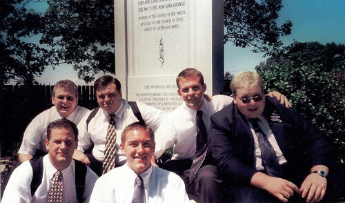 The Fort Smith Arkansas District in front of Elder Parley P. Pratt's grave on 6 June 2002
Back (left to right): Elder Cox, Elder Mullen, Elder Barker, Elder Gardner
Front: Elder Tinney, Elder Rasmussen

Elder Parley P. Pratt, a Member of the Council of 12 Apostles of the Church of Jesus Christ of Latter-day Saints, was killed near Alma, Arkansas in May, 1857, while doing Missionary work.  We held a District Meeting there to help us remember the efforts of the early Latter-day Saints.
Michael Hyrum Cox
08 Feb 2003