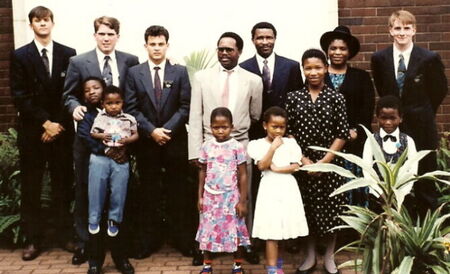 Moloi Family and Steven Mthembu.  Back Row Elder Ward, Elder Thompson, Elder Lotter, Steven Mthembu, Amos and Sibongile Moloi, Elder Burrow. Front Row, Muzi Moloi holding Sezway Moloi, 2 girls (Sorry, don't known their names) Bridget and David Moloi.  Taken in front of the Durban Chappel
Kevin Lyle Thompson
12 Feb 2008