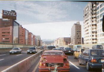 Driving was probably one of the most frustrating aspects of being in the office.  Here is the usual scene on the high-rise expressway.
Joseph  Burkhead
16 Sep 2003