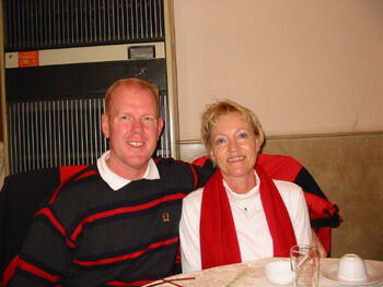 Former Taiwan missionaries, Bob &  Gloria DeWitt (Gloria Robertson), at the Grape Restaurant in Shanghai during a visit to Shanghai by President & Sister Nielsons in Nov 2003.  The DeWitts are assigned to the U.S. Consulate in Shanghai and have been there since August 2001.
Robert (Bob) C. DeWitt         杜維浩
18 Mar 2005