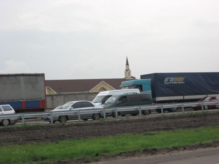 #45 We turned around and I was able to get a few pictures of the Stake Center. I had to time it carefully because there were lots of truck obscuring my view. We are now driving <a href=