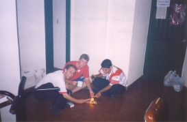 Ok, I know I'm mostly putting pictures of scenery in, but I just love this picture so much. Here's me (on the left), Elder Ence (who later became AP), and Elder Araujo, having built a campfire on the apartment floor in Concepcion. The lesson to be learned is, buildings in Argentina aren't like they are here. They're mostly brick, so they won't burn. That's why you have people shooting fireworks off in the streets on New Years and Christmas.
David  Sallay
24 May 2004