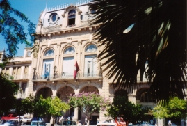 Here's the casa de gobierno en Salta, right off plaza 9 de Julio. The reddish colored flag hanging off it is Salta's provenicial flag.
David  Sallay
24 May 2004