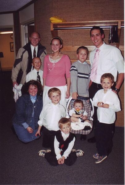 This is a current picture of my family.  For those that remember me, I haven't changed much (still have the shine up top).  The event in this picture is my son's mission farewell.  Our kids age from 1 to 19.
Rob MacKay
19 Nov 2008