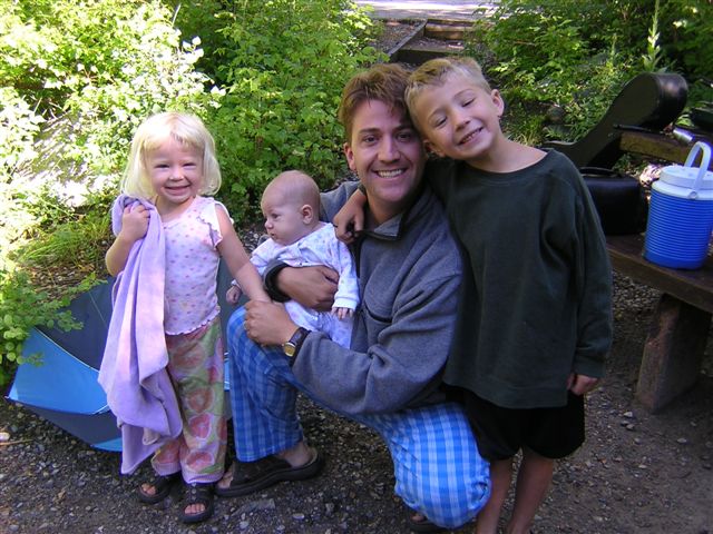My wife took this picture while we were on a campout in July 2004. Pictured are me, my son Parley, my daughter Brianna, and my baby girl Lily. I would make a great PAIS-F contact wouldn't I?!
Andrew  Lambert
30 Sep 2004