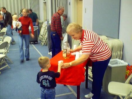 Adam getting a drink at the ward Christmas party(2001).
Kenneth Adam Becker
26 Jan 2002