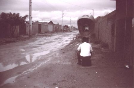 Elder Simmons talking under an orelhao (big ear) public telephone. It just recently rained.
Michael J. Simmons
12 Jan 2003