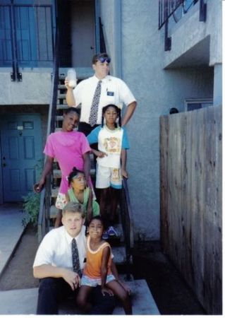 This is one of my favorite pictures from my mission.  This was back in the summer of '93.  In the picture are Elder Doom, my trainer (top), myself, and some of the neighbor kids who lived in the apartment building across from us.  Every night when we came home, they would be outside and would start yelling, 