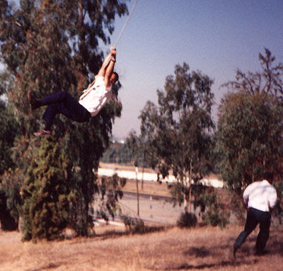 After developing a snapshot of Elder Hekekia on a tree swing, captured in the lower right hand corner appears to be an unusual creature in the form of Sasquatch.
Dan  Wilson
28 May 2000