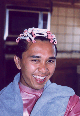 Elder Chris Quirante, happy even on the worst hair days.
Scott  Cravens
03 May 2001