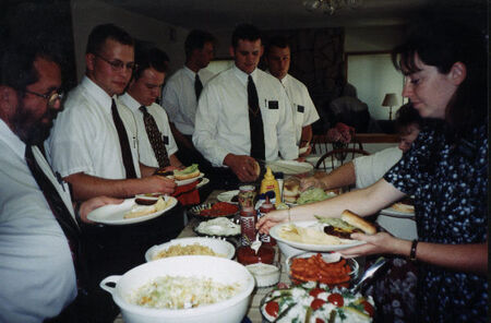 Dinner at the mission home for new Elders and Sisters.  Bill Turner in the front.
Dustin  Colley
15 Oct 2001