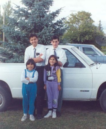 Named after a slide show we used to show on the Reservation. That's Munoz and I with two of the member girls when we served on Carry-The-Kettle. That truck was my favorite mission vechicle, next to my buss pass of course.
Mark  Coffey
28 Feb 2006