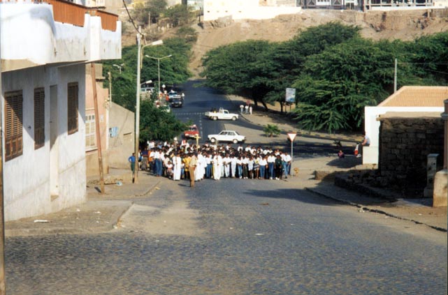 The majority of Cape Verde is Catholic, as the Portuguese explorers brought their religion with their conquest.  I believe this procession was on either Good Friday or Palm Sunday.
Darin  DeMille
16 Dec 2002