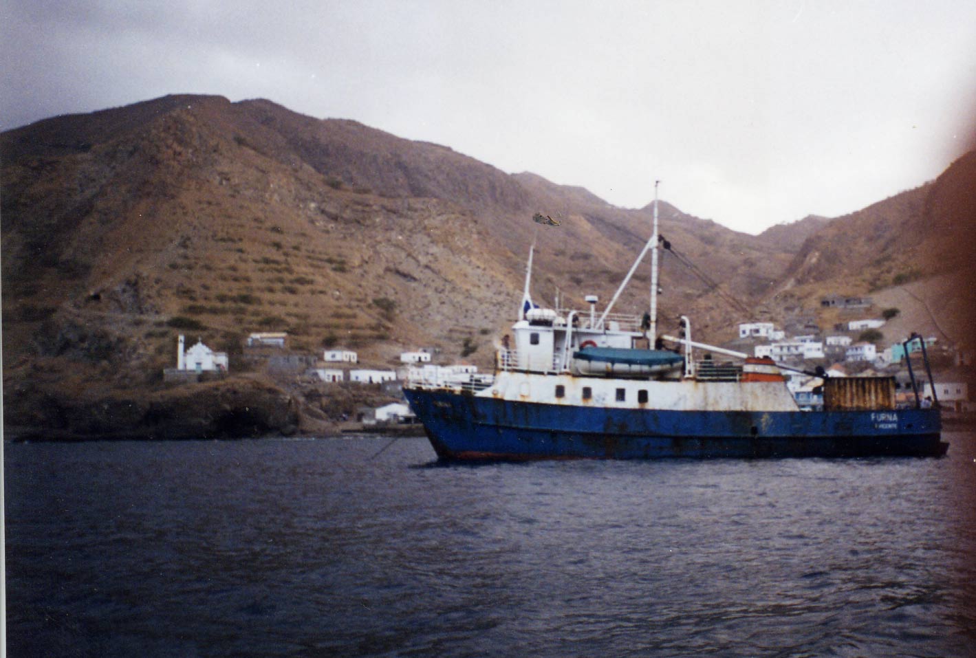 This little tugboat was used for inter-island travel and guaranteed to make you sick.  Here it is docked at the port village of Furna on Brava.
Mark Homer Coulam
23 Jul 2003
