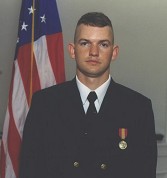 Man, 13 Weeks of Officer training will make you this grumpy and serious.  Ensign Hunt  Dec 18, 2003 Comissioning it was for the photo you can't smile in the military pictures.
Andrew Brian Hunt
07 Jun 2004