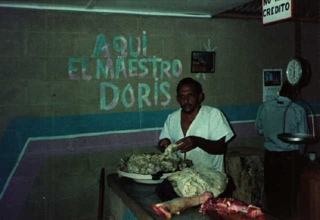 Want some meat?  This is the local meat counter in Nibaje.
Yes that's a cow's foot and those are intestines (mondogo).
Benjamin F. Cluff
13 Jun 2001