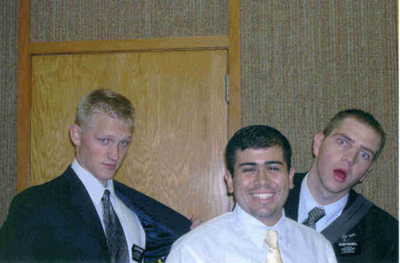 Elder Wyner admires himself for the camera while Elder Russell appears to be in shock with a member standing in the middle of it all.
Derek Hernandez
29 Jul 2003