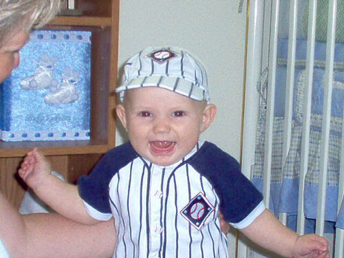 He is already playing catch with dad!
Cameron  Langworthy
09 May 2005