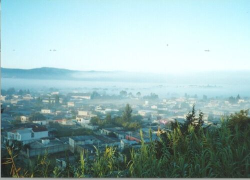 I took this picture one misty moring on top of a hill from our house.  (For those of you who have been there this is looking down from 