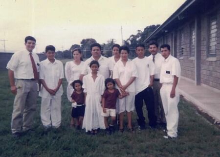This is the Porfirio Euseda Family from the La Paz Ward in La Lima.  Also with the family is Lucy and a young man named Pedro.  I am on far left and E. Mazariegos from Guatemala is on the far right.
Howard M. Janec
03 Feb 2002