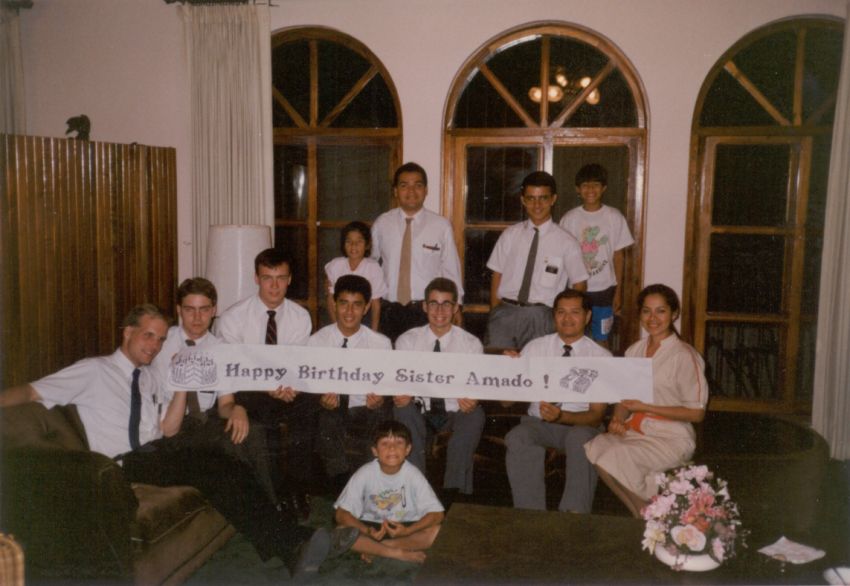 The Amado family and mission office Elders at Sister Amado's birthday party.
Ken  Anderton
08 Apr 2003