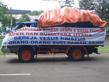 One of the 7 trucks, provided by Church members, loaded with hygiene kits, displaying the banner, “Humanitarian Aid for the Earthquake and Tsunami Victims in Aceh and north Sumatra – The Church of Jesus Christ of Latter-day Saints.” (Photo courtesy President Dean C. Jensen)
Ralph R. Zobell
05 Jan 2005