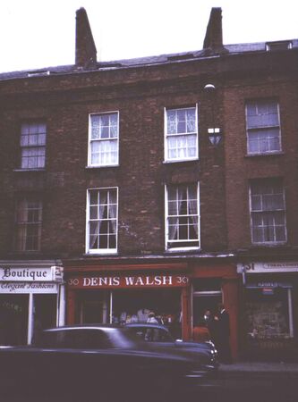 This is the Cork Meeting house on Washington St in 1975.  We met in the upper two floors.
Russ  Parker
07 Dec 2002