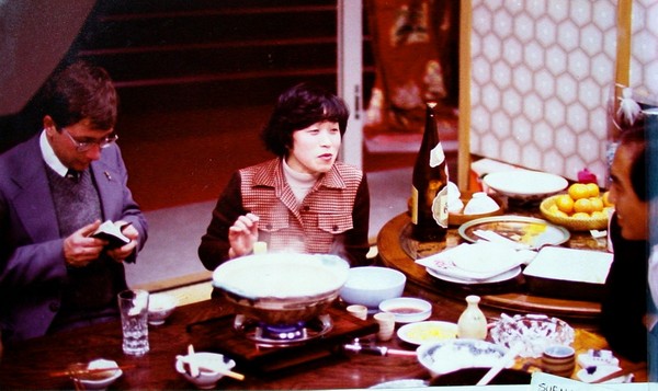 Typifying the frenetic dictionary search for words by all diligent greenbeans, Elder Leon Wiswell (L) struggles understand the conversation at a dinner.
R. Lee  Richan
17 Dec 2005