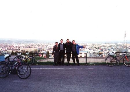 For those who served in Suehiro (NW Asahikawa district) Dai Ichi ward, you'll remember you had to climb this hill on your bike everyday to get to the kobetsu areas of Shunkodai. We're in the High School parking lot overlooking the baseball field and our Suehiro down below. From the left: Brinkerhoff, Billy Michael Smith, Boyle, and Dillon choro.
Jim Dillon
03 Nov 2004