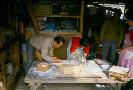 Rolling the omochi into balls after it's been pounded into a dough consistancy.  Very delicious when deep friend or with a bean type sauce.  Anyone remember what it's called?
David  van der Leek
18 Aug 2003