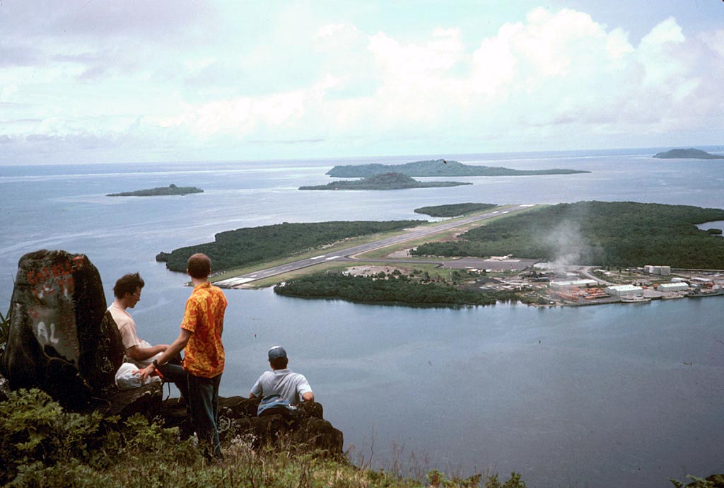 Elders Strauss, Durham, and DeLeon view the airport after climbing Sokehs Rock
David  Johnson
05 Sep 2004