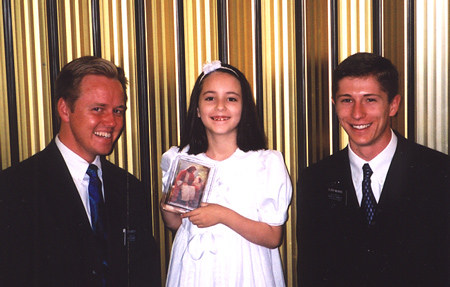 Elders Jantzen Anderson and Bryan McBride celebrate the baptism of Jennifer Johnson on June 1, 2002.
Steve Johnson
10 Jan 2004