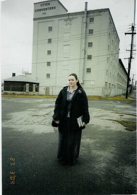 Yes its the required picture of a Utica missionary in front of the Utica Converter Co.!
Bethany  Byington
07 May 2004