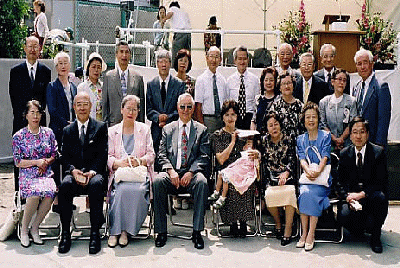 The above photo is from President Anderson taken at the 100th Anniversary celebration last fall in Yokohama. Of the 135 Japanese Saints who sacrificed nearly everything to go to the Hawaiian Temple in 1965, over 90% of them are still active! 
President Anderson is very proud of that accomplishment, and should be. We plan to publish the whole story in Pres. Andersons own words about how the entire project came to be and the miracles that happened to make it a reality.  ALL OF THE MEMBERS IN THE PICTURE ABOVE ARE PART OF THE ORIGINAL GROUP THAT WENT TO THE TEMPLE in 1965.
Webmaster Wayne
05 May 2003