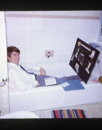 This is Elder Frogley Studing the discussions. Note that we had flannel board discussions. Oct. 1972
Kenneth D. Dixon
26 Mar 2007