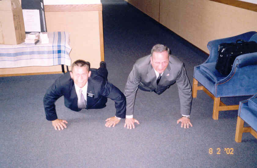 '02- President CAMERON DOING PUSH UPS WITH AN ELDER
Ashley Dawn Neilson
12 Feb 2003