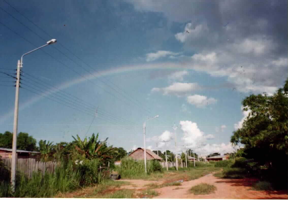 A rainbow over Puerto Maldonado on an afternoon in Jan. 2000
One of those houses belonged to the Banda family.
Michael J. Goble
23 Jan 2002