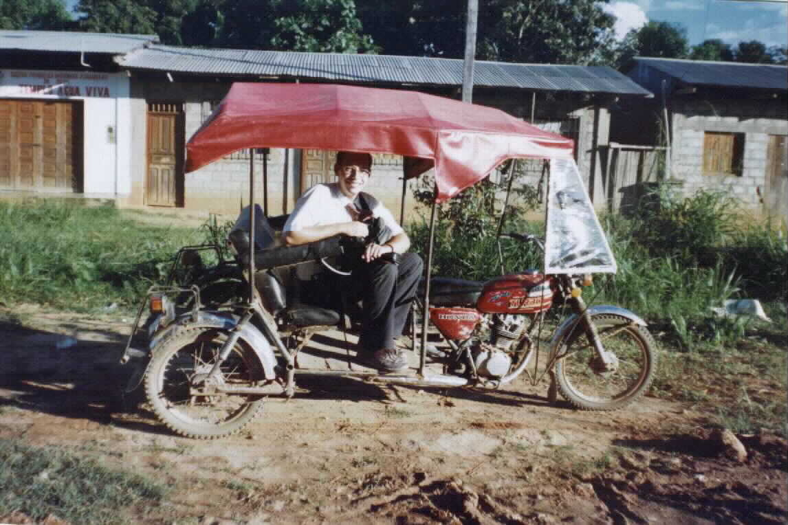 The Mototaxi- bizarre cross between an antique car and a motorcycle. 
Fun but dangerous. Jan. 2000
Michael J. Goble
23 Jan 2002