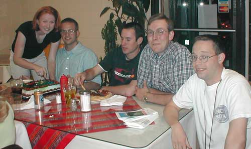 Group picture posing with the Bartons as they cut Jesse's birthday cake
Michael J. Goble
24 Apr 2002