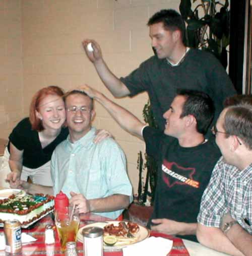 Russ Orton and Jake Eggett carry on a time- honored Peruvian tradition in celebration of Jesse Barton's Birthday.  Barton never even saw it coming.
Michael J. Goble
24 Apr 2002