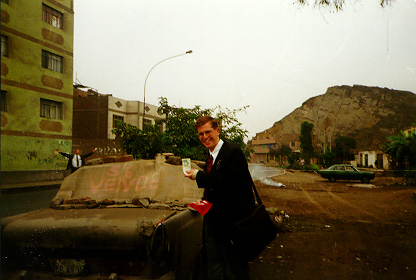 picture was taken in Zona Eter (Palao), in San Martín de Porres, when Elder Bryner (in the background) and I ran across a very cheap car for sale.
Jonathan L. Plowman
10 May 2001